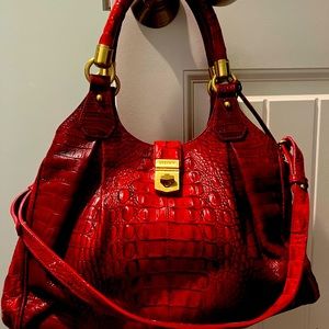 Brahmin oversized bag with matching wallet. Great condition with dust ruffle bag